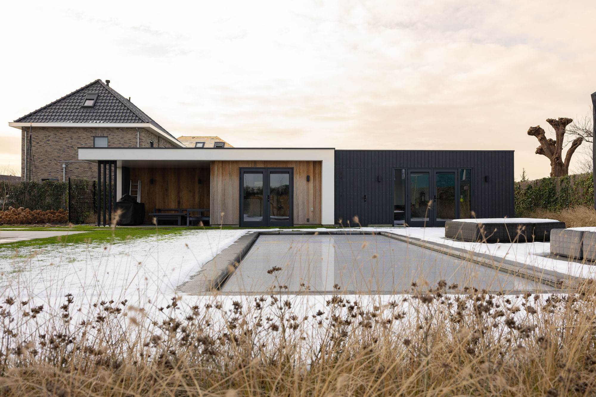 Een bijgebouw ontwerpen dat echt bij de woning past: waar let je op?